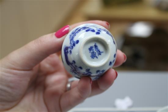 Six 19th century Chinese blue and white horses tea bowls and a later blue and white tray, length 16cm